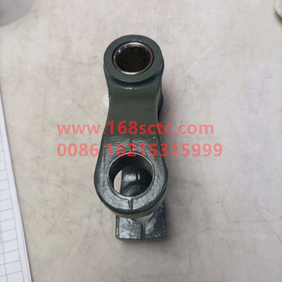 Front spring lifting ear assembly